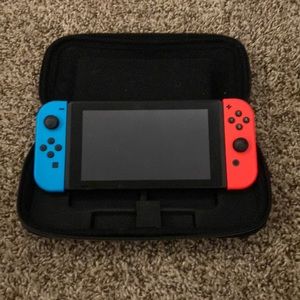 I’m selling a Nintendo switch with a case, charger, one game, controller.